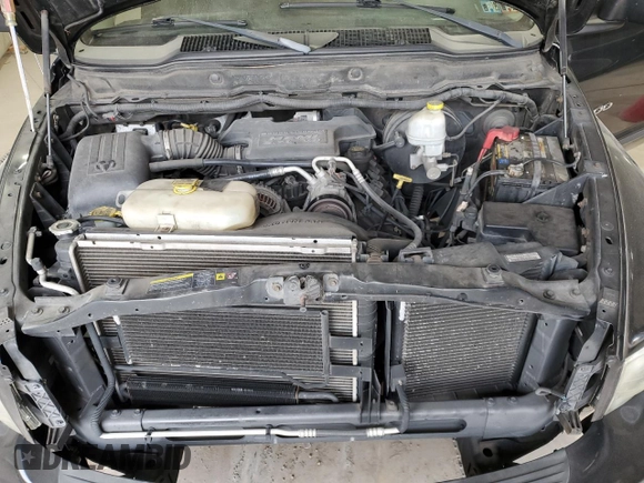 2004 Dodge 1500 ST with VIN 1D3HU18D24J205931, listed as a Copart auction lot 82559654 with 104,793 mi miles and Salvage Title. Bid and sale history available at carsss.com. Image 11.