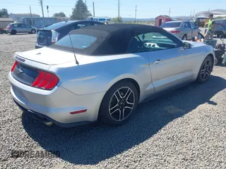 2018 Ford Mustang EcoBoost Premium z VIN 1FATP8UH9J5110286, wystawiony jako IAAI lot #42632454 z przebiegiem 60 355 mil mil oraz . Historia ofert i sprzedaży dostępna na DreamBid. Obrazek 4.
