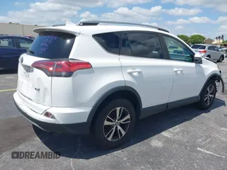 2018 Toyota RAV4 XLE with VIN 2T3WFREV9JW490324, listed as a IAAI auction lot 42298261 with 167,727 mi miles and . Bid and sale history available at DreamBid. Image 4.