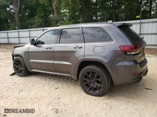2015 Jeep Grand Cherokee SRT with VIN 1C4RJFDJ9FC842448, listed as a Copart auction lot 56956284 with 178,141 mi miles and Salvage Title. Bid and sale history available at carsss.com. Image 2.