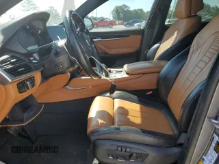2016 BMW X6 xDrive50i with VIN 5UXKU6C52G0S82464, listed as a Copart auction lot 63145703 with 80,064 mi miles. Bid and sale history available at carsss.com. Image 7.