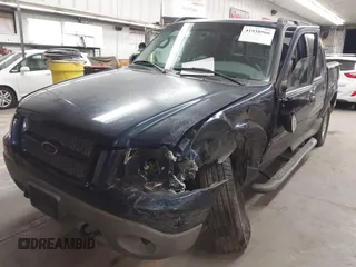 2003 Ford Explorer Sport Trac XLS z VIN 1FMDU77E03UC07089, wystawiony jako IAAI lot #41938966 z przebiegiem 128 982 mil mil oraz . Historia ofert i sprzedaży dostępna na DreamBid. Obrazek 2.