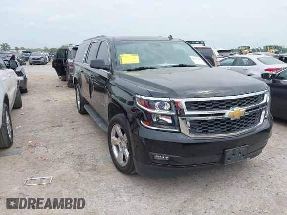 2015 Chevrolet Suburban LT with VIN 1GNSCJKC1FR304656, listed as a IAAI auction lot 42071124 with 133,140 mi miles. Bid and sale history available at carsss.com. Image 1.