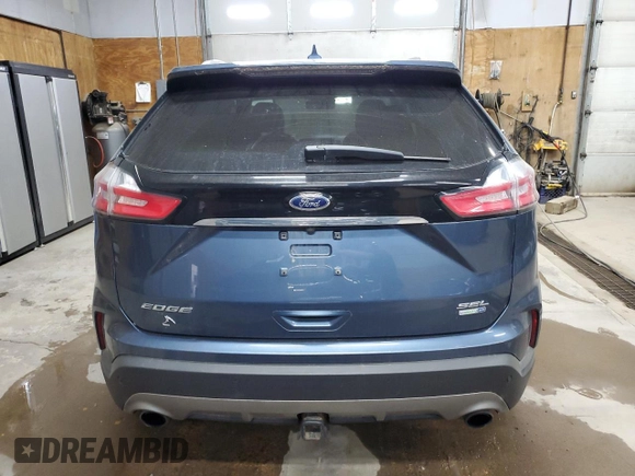 2019 Ford Edge SEL z VIN 2FMPK4J96KBB12912, wystawiony jako Copart lot #61029835 z przebiegiem 93 474 mil mil oraz Czysty tytuł • Clean title. Historia ofert i sprzedaży dostępna na DreamBid. Obrazek 6.