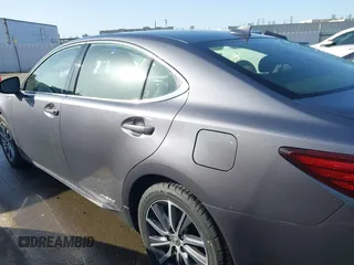 2016 Lexus ES 300h z VIN JTHBW1GG6G2108510, wystawiony jako IAAI lot #41959175 z przebiegiem 142 882 mil mil oraz . Historia ofert i sprzedaży dostępna na DreamBid. Obrazek 14.