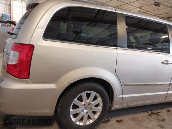 2014 Chrysler Town & Country Touring with VIN 2C4RC1BG2ER422914, listed as a IAAI auction lot 42017742 with 49,856 mi miles and . Bid and sale history available at DreamBid. Image 22.