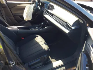2020 Mazda 6 Sport with VIN JM1GL1UM7L1527203, listed as a IAAI auction lot 41378087 with 57,174 mi miles and . Bid and sale history available at DreamBid. Image 5.