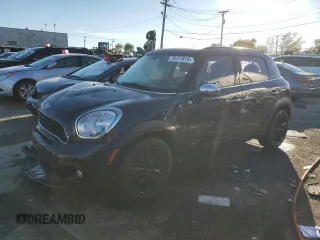 2013 MINI Countryman S ALL4 with VIN WMWZC5C52DWP31225, listed as a Copart auction lot 76177814 with 177,385 mi miles and Salvage Title. Bid and sale history available at DreamBid. Image 1.