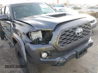 2021 Toyota Tacoma 4WD SR5 with VIN 3TMDZ5BN2MM108586, listed as a IAAI auction lot 41604953 with 65,422 mi miles. Bid and sale history available at carsss.com. Image 6.