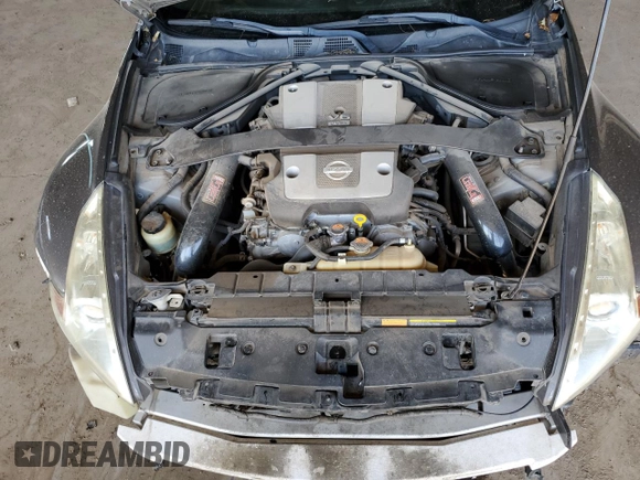 2012 Nissan 370Z Touring with VIN JN1AZ4EH9CM564312, listed as a Copart auction lot 52127525 with 134,465 mi miles and Salvage Title. Bid and sale history available at carsss.com. Image 11.