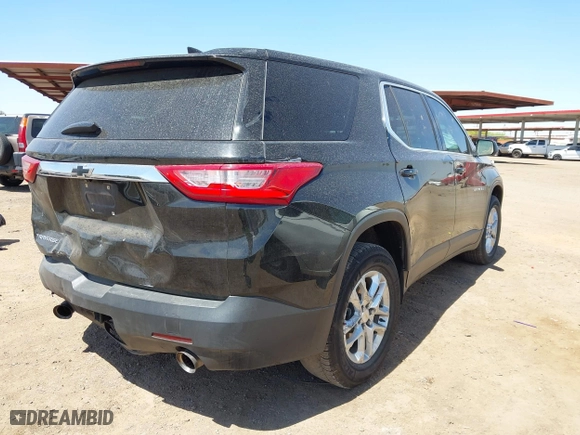 2021 Chevrolet Traverse LS with VIN 1GNERFKW0MJ165988, listed as a IAAI auction lot 42018002 with 72,315 mi miles. Bid and sale history available at carsss.com. Image 4.