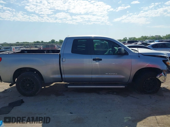 2011 Toyota Tundra with VIN 5TFRM5F18BX033833, listed as a IAAI auction lot 42257200 with 108,046 mi miles and . Bid and sale history available at DreamBid. Image 13.