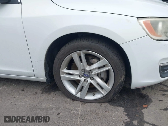 2014 Volvo S60 T5 с VIN YV1612FS0E1286021, выставлен на аукционе IAAI как лот 41708156 с пробегом 115 376 миль миль и . История ставок и продаж доступна на DreamBid. Изображение 13.