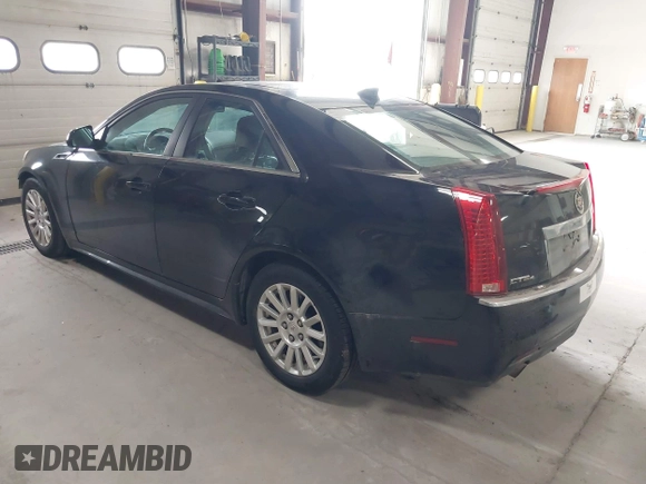 2011 Cadillac CTS Luxury with VIN 1G6DG5EYXB0145058, listed as a IAAI auction lot 41973156 with 143,246 mi miles and . Bid and sale history available at carsss.com. Image 3.