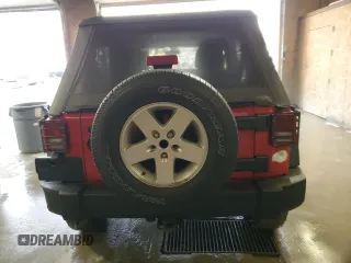 2012 Jeep Wrangler Unlimited Sport z VIN 1C4HJWDG2CL117124, wystawiony jako Copart lot #57288435 z przebiegiem 134 860 mil mil oraz Czysty tytuł • Clean title. Historia ofert i sprzedaży dostępna na DreamBid. Obrazek 6.