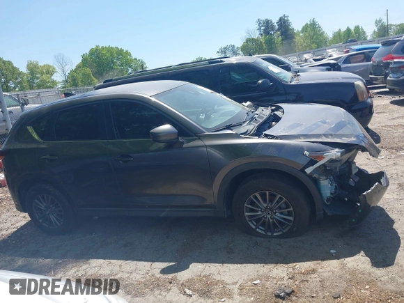 2017 Mazda CX-5 Touring with VIN JM3KFACL5H0197432, listed as a IAAI auction lot 42060117 with 1 mi miles. Bid and sale history available at carsss.com. Image 13.