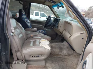 1999 GMC Yukon with VIN 1GKEK13R9XJ807786, listed as a IAAI auction lot 41478109 with 193,748 mi miles. Bid and sale history available at carsss.com. Image 5.