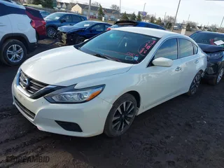 2018 Nissan Altima 2.5 SR with VIN 1N4AL3AP4JC214424, listed as a IAAI auction lot 41801087 with 152,778 mi miles. Bid and sale history available at carsss.com. Image 17.