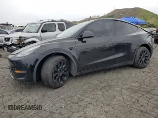 2021 Tesla Model Y Long Range z VIN 5YJYGDEE1MF100089, wystawiony jako Copart lot #53574785 z przebiegiem 97 782 mil mil oraz Szkoda całkowita • Salvage title. Historia ofert i sprzedaży dostępna na DreamBid. Obrazek 1.