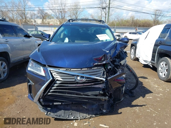 2016 Lexus RX 350 with VIN 2T2BZMCA2GC004895, listed as a IAAI auction lot 41859749 with 104,370 mi miles and . Bid and sale history available at DreamBid. Image 12.