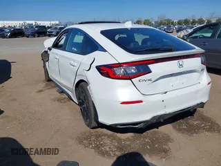 2024 Honda Civic Sport Touring z VIN 19XFL1G84RE029704, wystawiony jako IAAI lot #41659889 z przebiegiem Nie podano mil oraz . Historia ofert i sprzedaży dostępna na DreamBid. Obrazek 3.