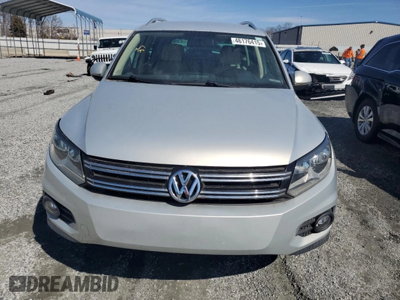 2012 Volkswagen Tiguan LE z VIN WVGAV7AX7CW525273, wystawiony jako Copart lot #46176415 z przebiegiem 155 851 mil mil oraz Czysty tytuł • Clean title. Historia ofert i sprzedaży dostępna na DreamBid. Obrazek 6.