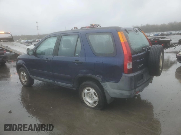 2004 Honda CR-V LX with VIN SHSRD78474U252663, listed as a Copart auction lot 52090185 with 202,703 mi miles and Salvage Title. Bid and sale history available at carsss.com. Image 2.