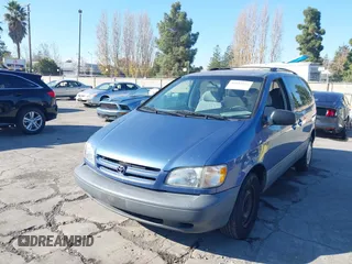 1999 Toyota Sienna LE with VIN 4T3ZF13C2XU126738, listed as a IAAI auction lot 41012127 with 218,080 mi miles. Bid and sale history available at carsss.com. Image 2.
