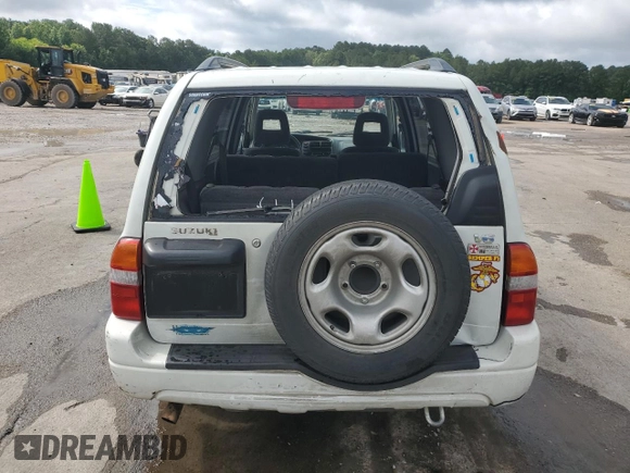 2002 Suzuki XL7 Standard z VIN JS3TY92V024106089, wystawiony jako Copart lot #58418685 z przebiegiem 232 254 mil mil oraz Szkoda całkowita • Salvage title. Historia ofert i sprzedaży dostępna na DreamBid. Obrazek 6.