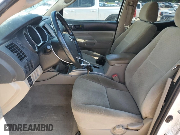 2007 Toyota Tacoma PreRunner z VIN 3TMJU62N27M037921, wystawiony jako Copart lot #56939075 z przebiegiem 203 275 mil mil oraz Szkoda całkowita • Salvage title. Historia ofert i sprzedaży dostępna na DreamBid. Obrazek 7.