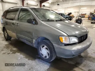 1999 Toyota Sienna LE with VIN 4T3ZF13C2XU123953, listed as a Copart auction lot 52193705 with 174,886 mi miles and Clean Title. Bid and sale history available at carsss.com. Image 4.