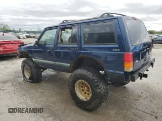 2000 Jeep Cherokee with VIN 1J4FF48S7YL209729, listed as a Copart auction lot 53647685 with 268,552 mi miles and Salvage title. Bid and sale history available at DreamBid. Image 2.