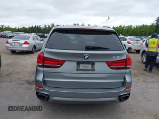 2014 BMW X5 xDrive50i with VIN 5UXKR6C54E0C02423, listed as a IAAI auction lot 42278044 with 122,370 mi miles and . Bid and sale history available at DreamBid. Image 16.