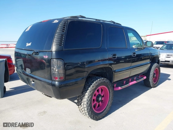 2004 Chevrolet Tahoe LT with VIN 1GNEC13ZX4R234118, listed as a IAAI auction lot 41840881 with 360,534 mi miles. Bid and sale history available at carsss.com. Image 4.