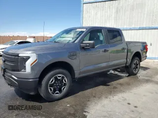 2022 Ford F-150 Lightning Pro z VIN 1FTVW1EL1NWG11964, wystawiony jako Copart lot #51126375 z przebiegiem Nie podano mil oraz Tytuł czysty. Historia ofert i sprzedaży dostępna na DreamBid. Obrazek 1.