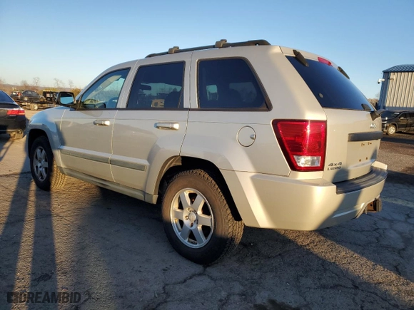 2009 Jeep Grand Cherokee Laredo with VIN 1J8GR48K89C551203, listed as a Copart auction lot 49252125 with 122,071 mi miles and Salvage Title. Bid and sale history available at carsss.com. Image 2.