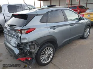 2021 Hyundai Kona SEL with VIN KM8K22AA4MU616767, listed as a IAAI auction lot 40977916 with 83,652 mi miles. Bid and sale history available at carsss.com. Image 4.