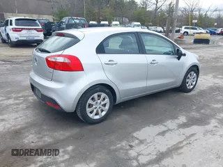 2012 Kia Rio LX with VIN KNADM5A36C6040934, listed as a IAAI auction lot 41970914 with 121,405 mi miles. Bid and sale history available at carsss.com. Image 4.
