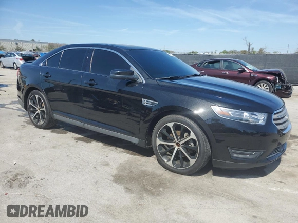 2015 Ford Taurus SEL with VIN 1FAHP2E87FG208522, listed as a Copart auction lot 46700095 with 97,439 mi miles and Salvage title. Bid and sale history available at DreamBid. Image 4.