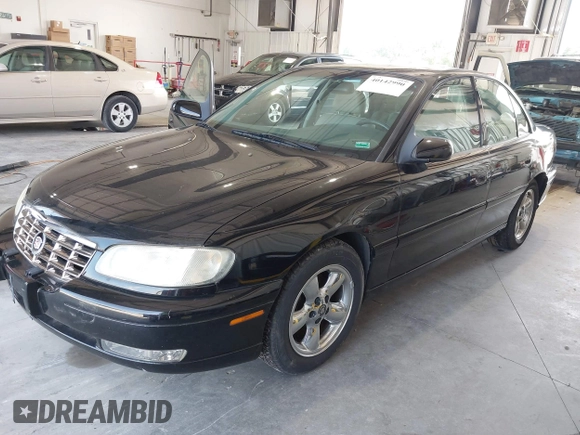 1997 Cadillac Catera z VIN W06VR54R9VR162389, wystawiony jako IAAI lot #40142990 z przebiegiem 111 558 mil mil oraz . Historia ofert i sprzedaży dostępna na DreamBid. Obrazek 2.