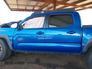 2016 Toyota Tacoma SR with VIN 3TMCZ5AN6GM037880, listed as a IAAI auction lot 42020623 with Not Provided miles and . Bid and sale history available at DreamBid. Image 14.