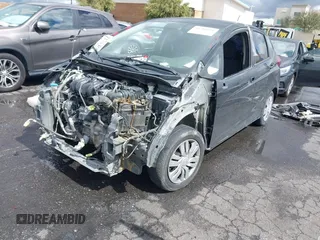 2016 Honda Fit LX with VIN JHMGK5H53GX012374, listed as a IAAI auction lot 41760754 with 146,836 mi miles. Bid and sale history available at carsss.com. Image 2.