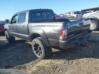 2009 Toyota Tacoma PreRunner with VIN 3TMJU62N09M079135, listed as a IAAI auction lot 41608120 with 230,384 mi miles. Bid and sale history available at carsss.com. Image 3.
