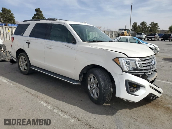 2019 Ford Expedition XLT with VIN 1FMJU1HT1KEA17386, listed as a Copart auction lot 51188035 with 132,588 mi miles and Salvage title. Bid and sale history available at DreamBid. Image 4.