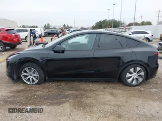 2023 Tesla Model Y Long Range z VIN 7SAYGDEEXPA181114, wystawiony jako IAAI lot #41564617 z przebiegiem 64 990 mil mil oraz . Historia ofert i sprzedaży dostępna na DreamBid. Obrazek 15.