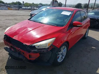 2015 Ford Focus SE with VIN 1FADP3K25FL233415, listed as a IAAI auction lot 42074326 with 213,246 mi miles. Bid and sale history available at carsss.com. Image 2.