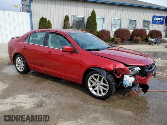 2012 Ford Fusion SEL with VIN 3FAHP0JA8CR362304, listed as a Copart auction lot 50771985 with 202,954 mi miles and Salvage Title. Bid and sale history available at DreamBid. Image 4.