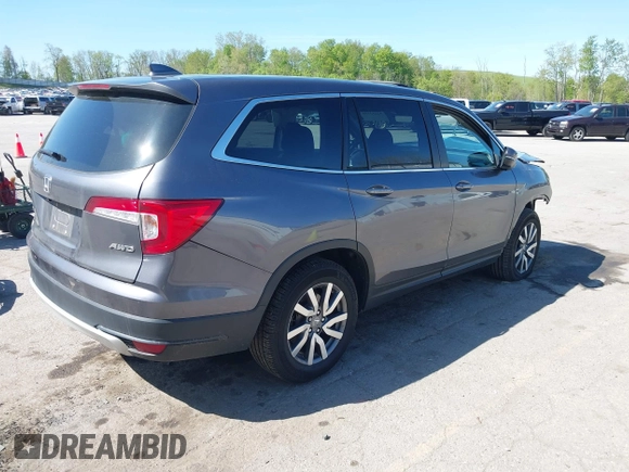 2020 Honda Pilot EX-L z VIN 5FNYF6H58LB049652, wystawiony jako IAAI lot #42213555 z przebiegiem 84 846 mil mil oraz . Historia ofert i sprzedaży dostępna na DreamBid. Obrazek 4.