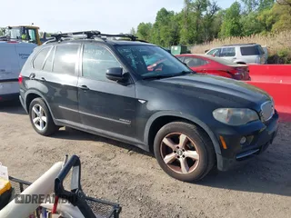2010 BMW X5 35d with VIN 5UXFF0C52ALJ99499, listed as a IAAI auction lot 42109157 with 126,797 mi miles. Bid and sale history available at carsss.com. Image 1.