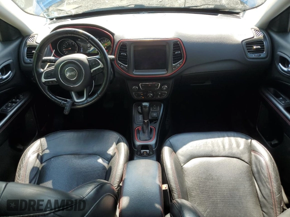 2018 Jeep Compass Trailhawk with VIN 3C4NJDDB7JT179423, listed as a Copart auction lot 61458605 with 100,949 mi miles and Salvage title. Bid and sale history available at DreamBid. Image 8.